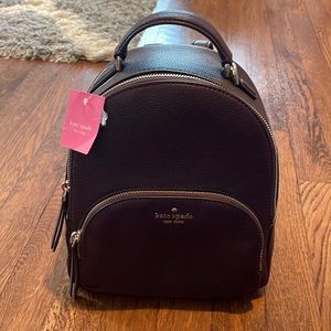 Dark purple Kate spade backpack never used tags still on